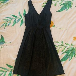 Black and gold metallic skater dress